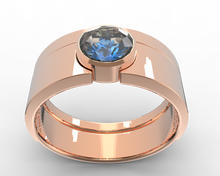 bezel ring set in rose gold and blue sapphire