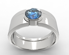 bezel ring set in sterling silver and blue sapphire